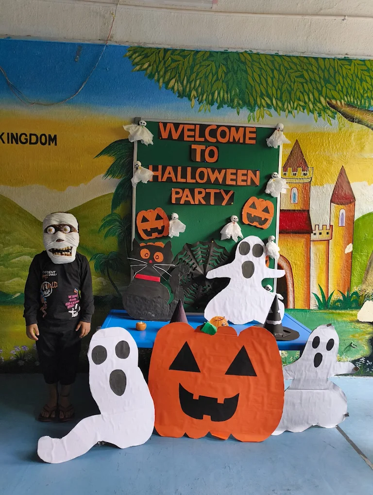 Child dressed in creative costume participating in a school theme celebration and paper craft showcase